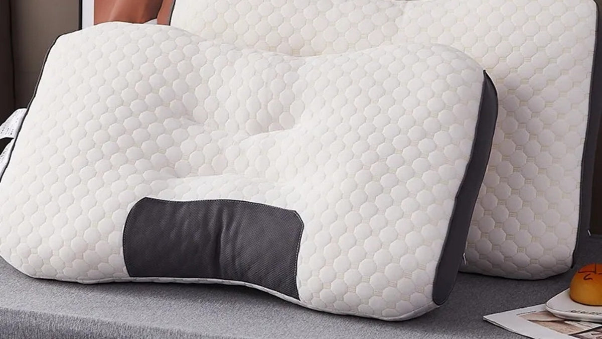 The Loft Pillow on a made bed