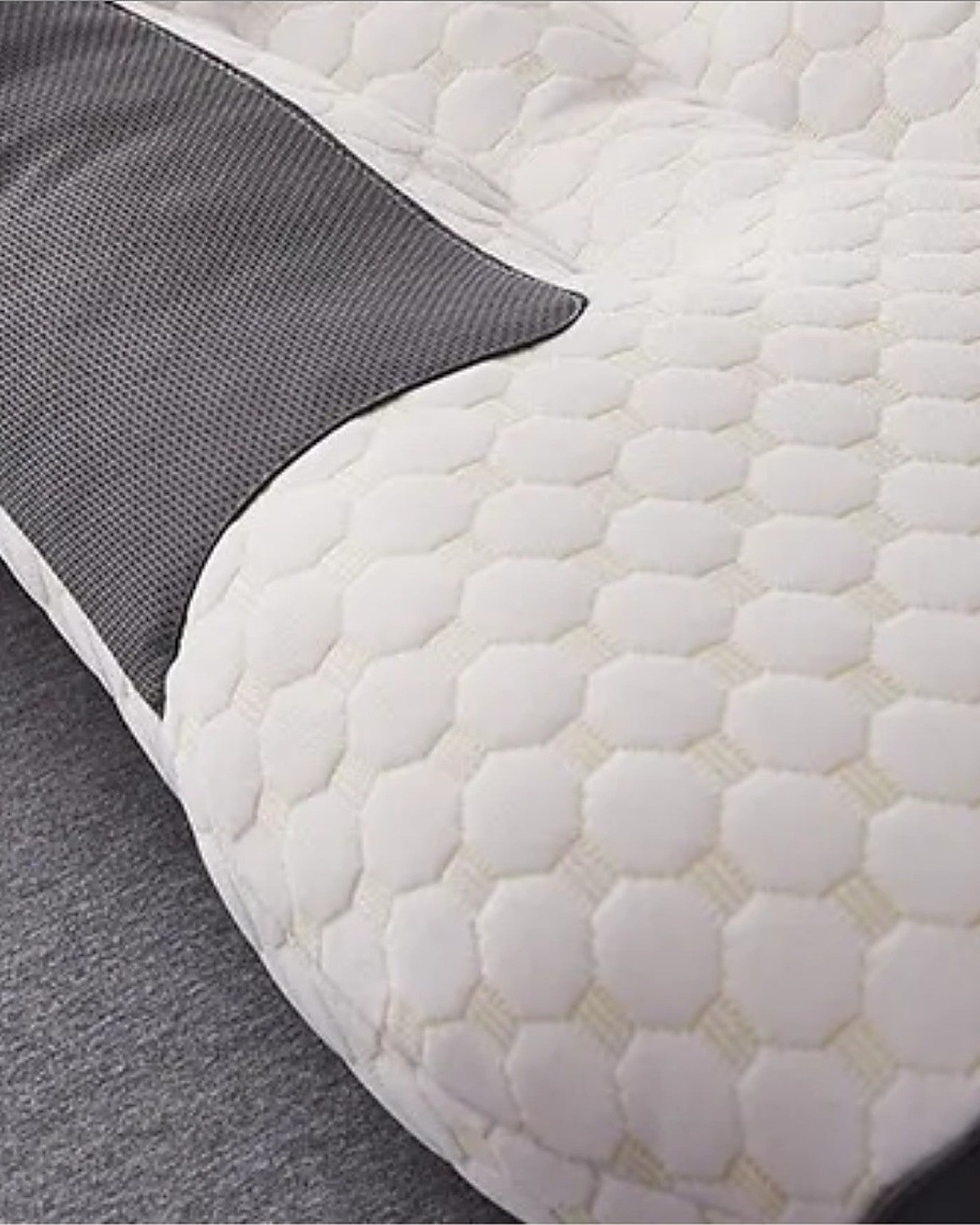 Close up of the knitted cotton cover and mesh panel